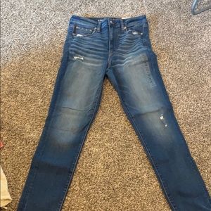 Dark blue ripped American eagle jeans